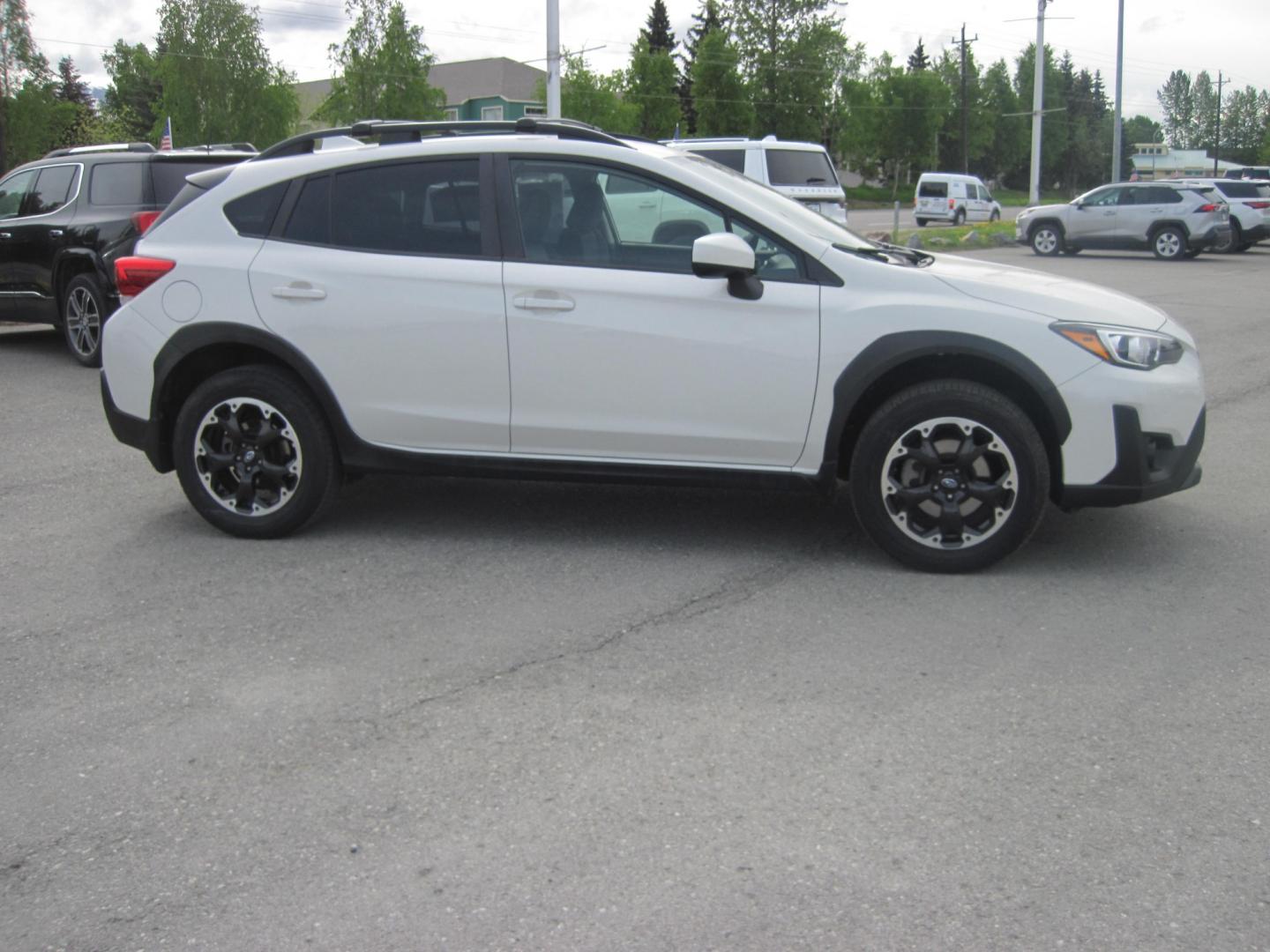 2021 white /black Subaru Crosstrek 2.0i Premium CVT (JF2GTAPC0M8) with an 2.0L L4 DOHC 16V engine, CVT transmission, located at 9530 Old Seward Highway, Anchorage, AK, 99515, (907) 349-3343, 61.134140, -149.865570 - Nice Subaru Crosstrek come take a test drive - Photo#2